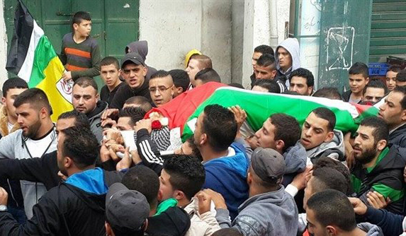 Thousands attend funeral of 2 Palestinians killed by Israel / Photos